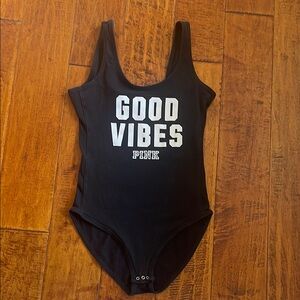 PINK Victorias Secret black bodysuit with white lettering. Size XS